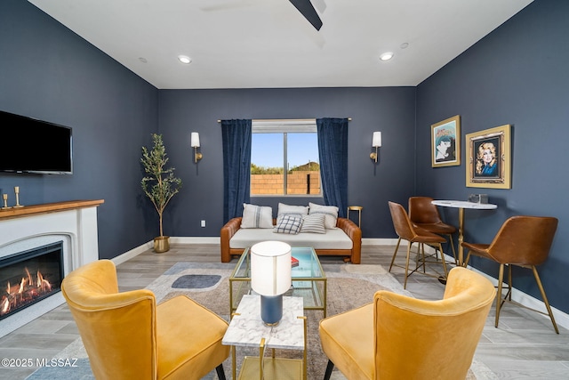 1144 S Castar Dr, Tucson, AZ 85745 - living area with ceiling fan, a glass covered fireplace, and recessed lighting