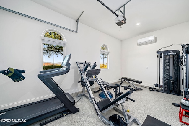 1144 S Castar Dr, Tucson, AZ 85745 - workout room with an AC wall unit and baseboards