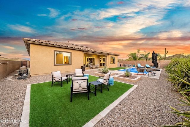 1144 S Castar Dr, Tucson, AZ 85745 - back of house with stucco siding, a fenced backyard, and a patio
