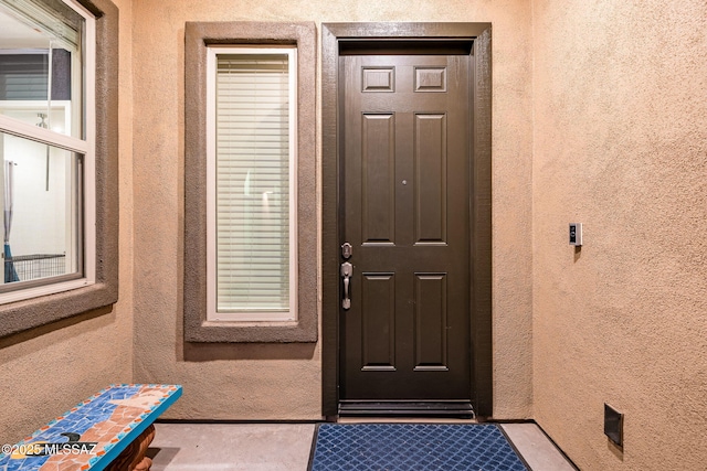 1144 S Castar Dr, Tucson, AZ 85745 - view of exterior entry with stucco siding