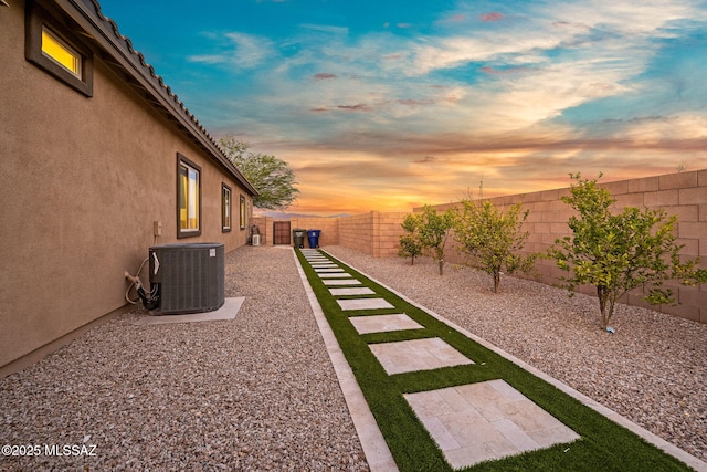 1144 S Castar Dr, Tucson, AZ 85745 - yard at dusk with a fenced backyard
