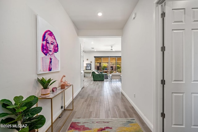 1144 S Castar Dr, Tucson, AZ 85745 - corridor with light wood-type flooring and recessed lighting