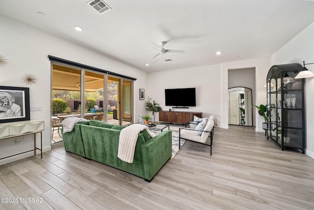 1144 S Castar Dr, Tucson, AZ 85745 - living room with ceiling fan, recessed lighting, and light wood-type flooring
