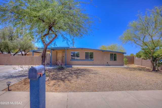 626 S Kellond Pl, Tucson, AZ 85710 - view of front of home with stucco siding