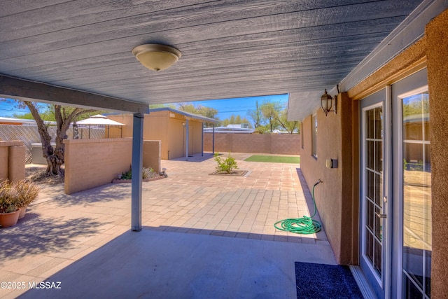 626 S Kellond Pl, Tucson, AZ 85710 - fenced backyard with a patio