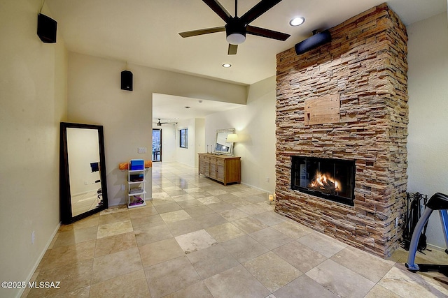 6530 N Finisterra, Tucson, AZ 85750 - view of patio / terrace with a stone fireplace and a ceiling fan