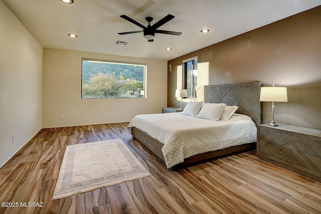 6530 N Finisterra, Tucson, AZ 85750 - bedroom with wood finished floors, recessed lighting, and ceiling fan