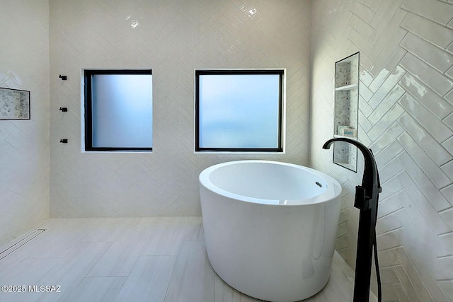 6530 N Finisterra, Tucson, AZ 85750 - full bath with a freestanding tub and tile walls