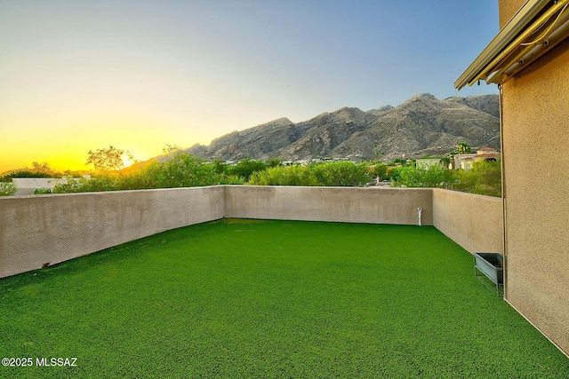 6530 N Finisterra, Tucson, AZ 85750 - yard at dusk featuring a mountain view