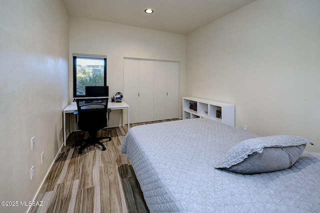 6530 N Finisterra, Tucson, AZ 85750 - bedroom featuring wood finished floors, a closet, and recessed lighting
