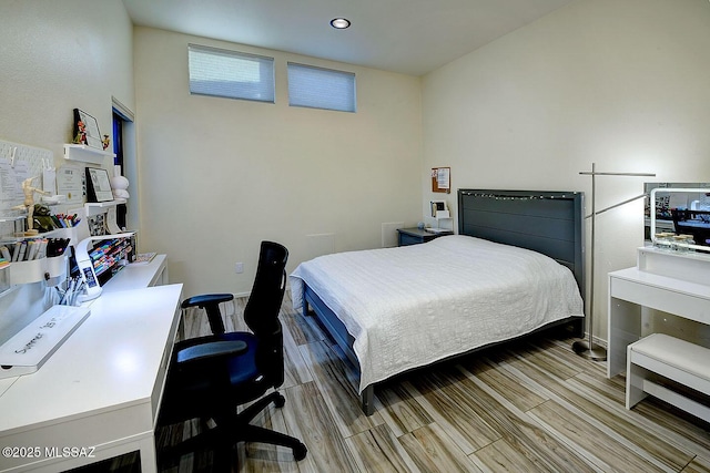 6530 N Finisterra, Tucson, AZ 85750 - bedroom featuring a desk and wood finished floors