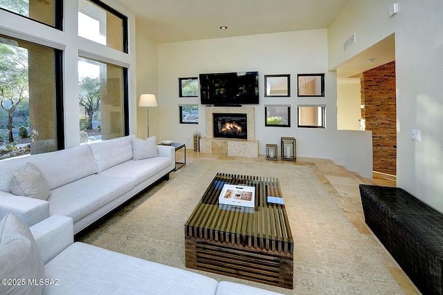 6530 N Finisterra, Tucson, AZ 85750 - living room with a fireplace and plenty of natural light