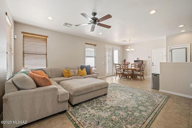656 W Paseo Celestial, Sahuarita, AZ 85629 - living room featuring a ceiling fan, light tile patterned floors, recessed lighting, and a chandelier