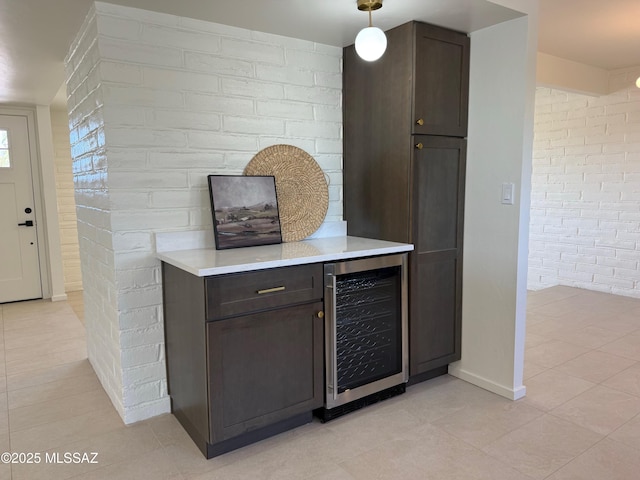 8324 E Beverly St, Tucson, AZ 85710 - detailed view of beverage cooler, brick wall, and a dry bar