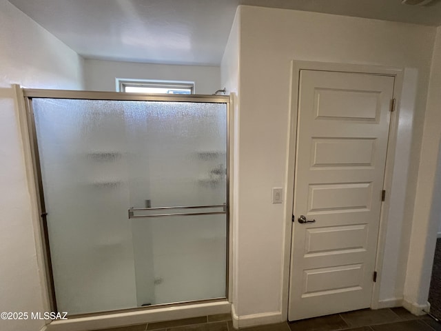 3306 N Baby Bruno Way, Tucson, AZ 85745 - bathroom with a stall shower and tile patterned flooring