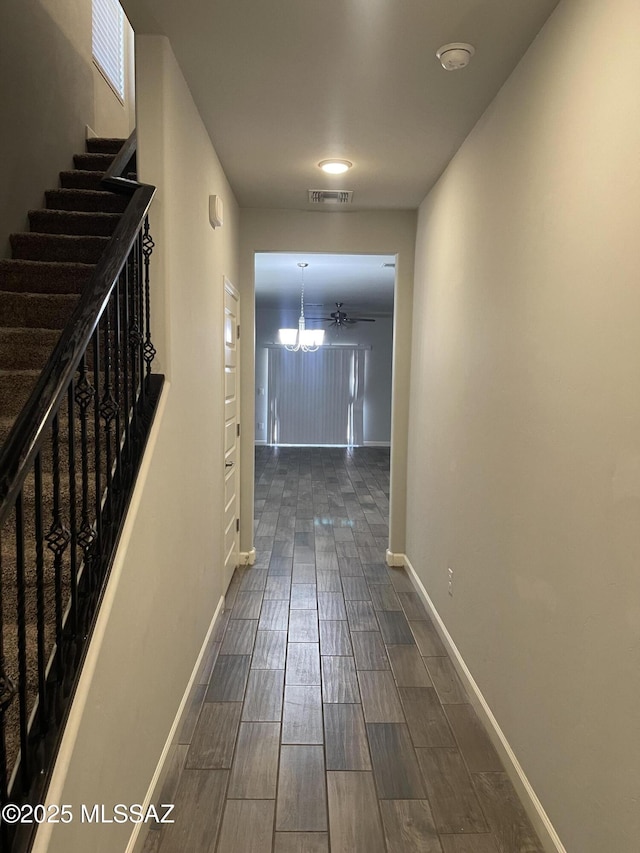3306 N Baby Bruno Way, Tucson, AZ 85745 - corridor featuring stairway and dark wood-style flooring