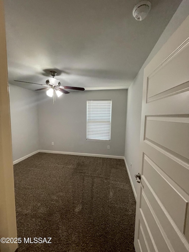 3306 N Baby Bruno Way, Tucson, AZ 85745 - unfurnished room featuring dark carpet and a ceiling fan