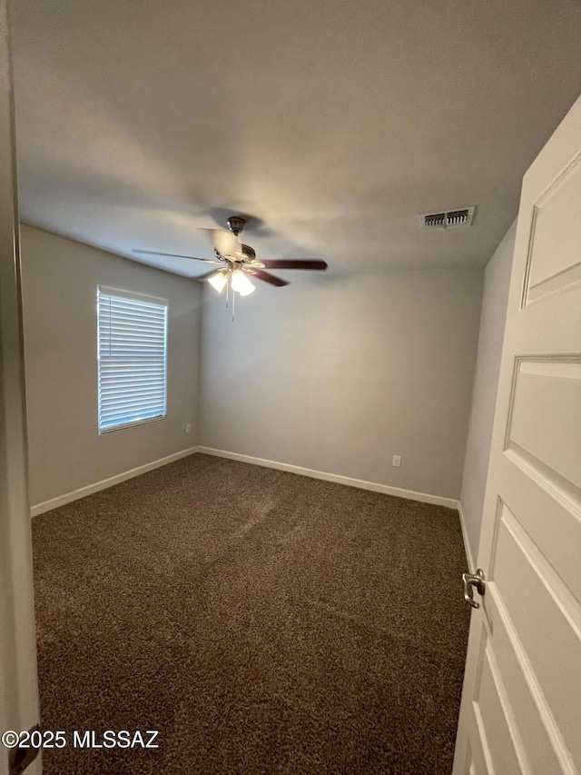 3306 N Baby Bruno Way, Tucson, AZ 85745 - carpeted spare room with baseboards and a ceiling fan