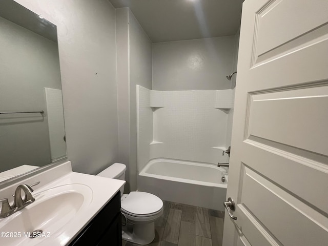 3306 N Baby Bruno Way, Tucson, AZ 85745 - bathroom featuring vanity, wood finished floors, and shower / washtub combination