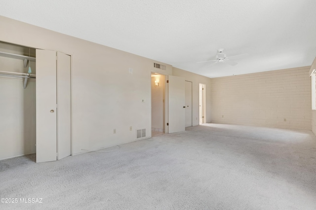 149 E La Huerta, Green Valley, AZ 85614 - unfurnished bedroom featuring carpet and a ceiling fan