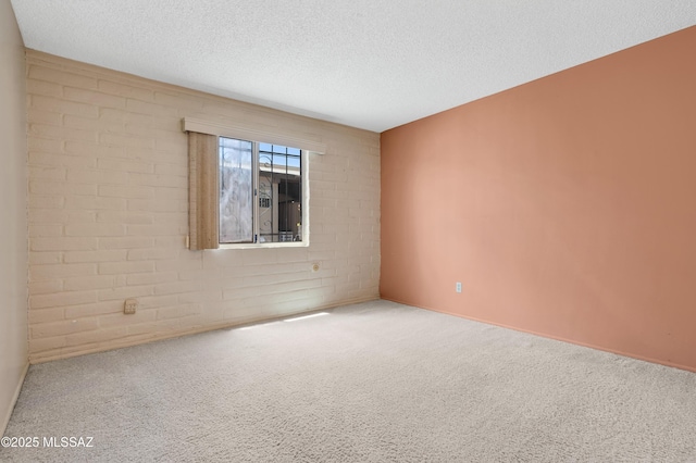 149 E La Huerta, Green Valley, AZ 85614 - carpeted empty room with a textured ceiling and baseboards