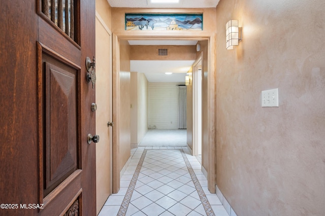 149 E La Huerta, Green Valley, AZ 85614 - hall featuring inlaid floor details and light tile patterned floors
