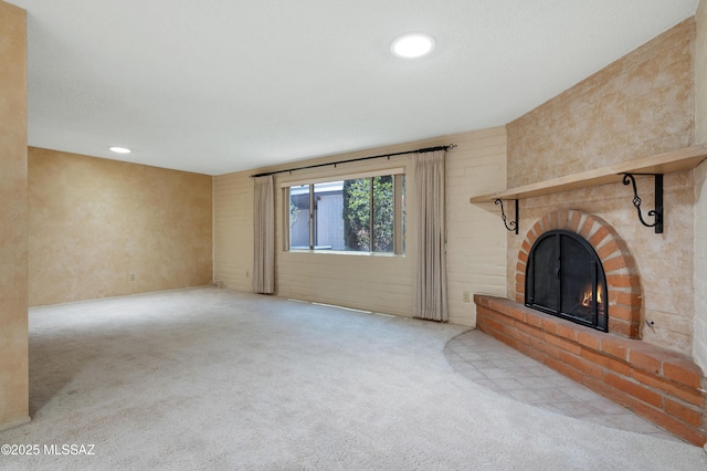 149 E La Huerta, Green Valley, AZ 85614 - unfurnished living room featuring carpet floors, a fireplace, and recessed lighting