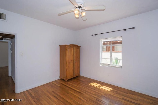 1816 E Waverly St, Tucson, AZ 85719 - spare room with wood finished floors and a ceiling fan