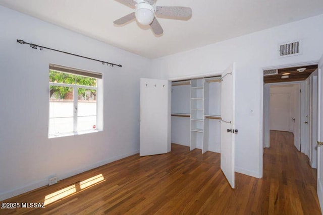 1816 E Waverly St, Tucson, AZ 85719 - unfurnished bedroom featuring wood finished floors, a closet, and ceiling fan