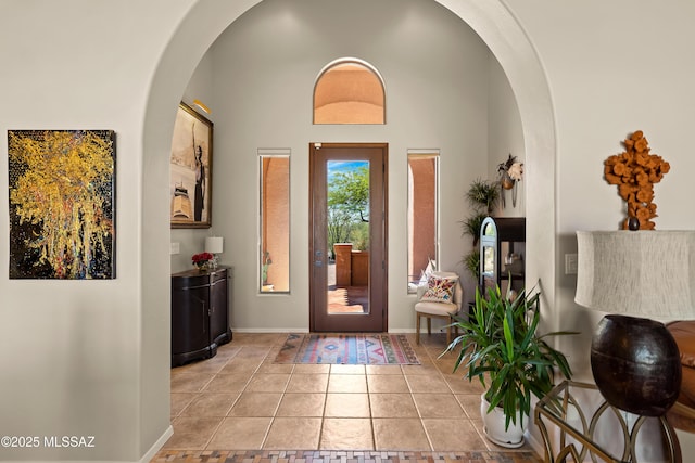 1511 E Placita Meseta Dorada, Oro Valley, AZ 85755 - tiled foyer with arched walkways and baseboards