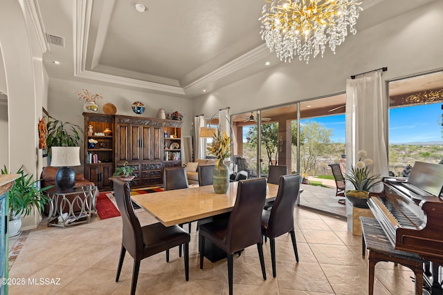 1511 E Placita Meseta Dorada, Oro Valley, AZ 85755 - dining room featuring a chandelier, a towering ceiling, a raised ceiling, crown molding, and recessed lighting