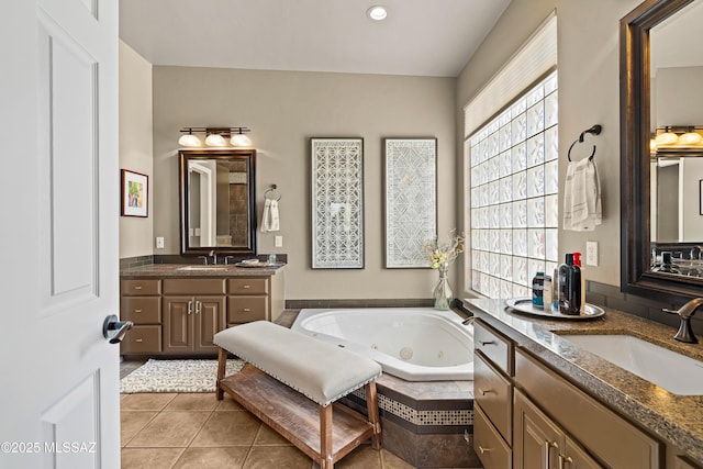 1511 E Placita Meseta Dorada, Oro Valley, AZ 85755 - full bathroom featuring a tub with jets, two vanities, and tile patterned floors