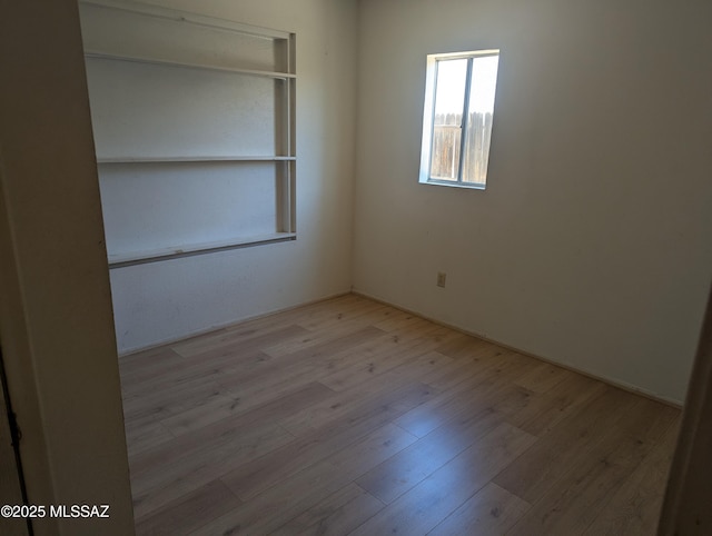 7088 S Camino Grande, Tucson, AZ 85746 - empty room with wood finished floors