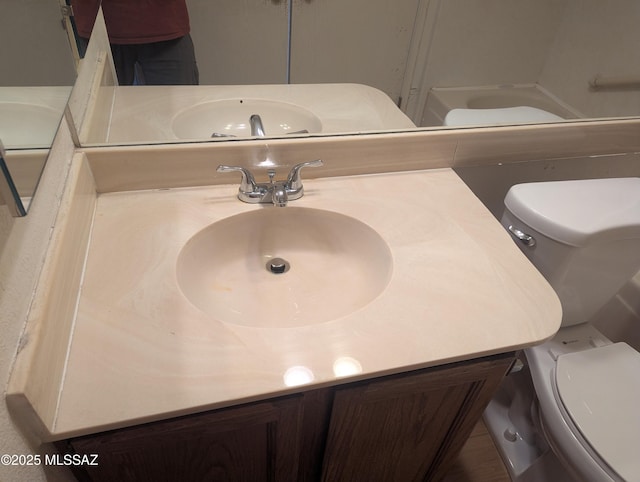 7088 S Camino Grande, Tucson, AZ 85746 - bathroom featuring toilet and vanity