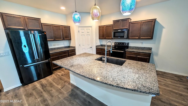 21511 E Prospector Pl, Red Rock, AZ 85145 - kitchen featuring freestanding refrigerator, dark brown cabinetry, black electric range, dark wood-style flooring, and recessed lighting