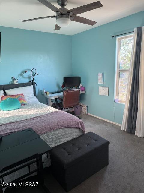 9150 N Wagon Spoke Ct, Tucson, AZ 85742 - bedroom with carpet and ceiling fan