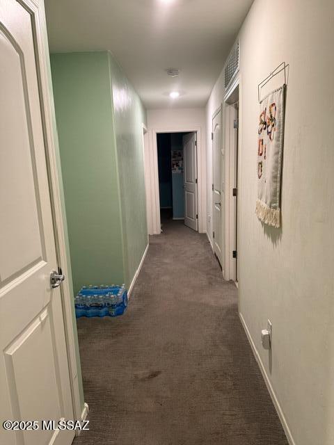 9150 N Wagon Spoke Ct, Tucson, AZ 85742 - hallway with carpet