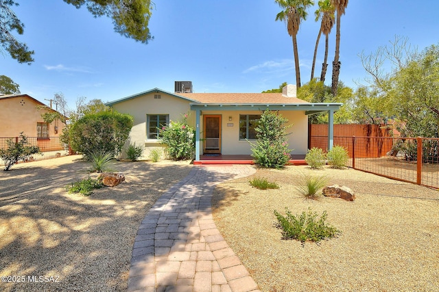 2421 E Drachman St, Tucson, AZ 85719 - ranch-style home with a porch, stucco siding, and a chimney