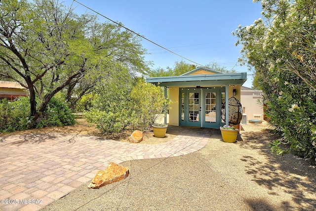 2421 E Drachman St, Tucson, AZ 85719 - view of patio featuring french doors