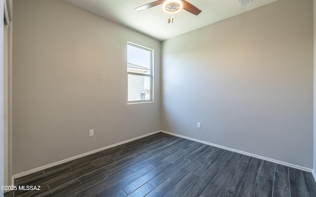 8820 E Stone Meadow Cir, Tucson, AZ 85730 - empty room with dark wood finished floors and a ceiling fan