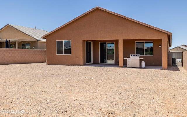 8820 E Stone Meadow Cir, Tucson, AZ 85730 - rear view of house with a patio area and stucco siding