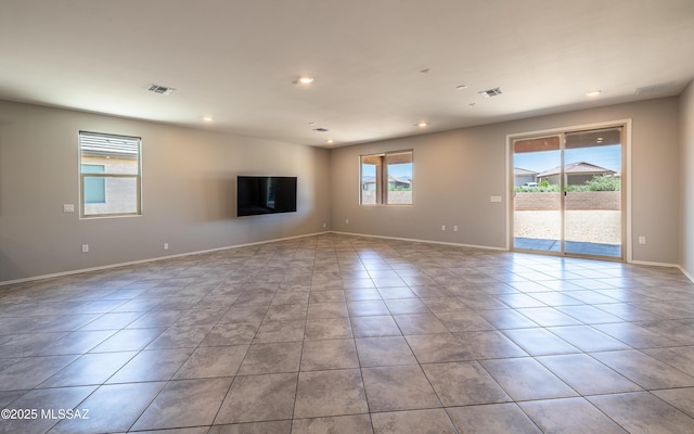 8820 E Stone Meadow Cir, Tucson, AZ 85730 - tiled empty room featuring recessed lighting and baseboards