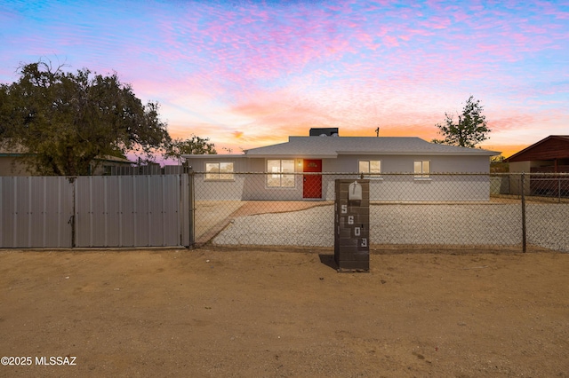 5609 E Juarez St, Tucson, AZ 85711 - view of front of house with a gate and a fenced front yard
