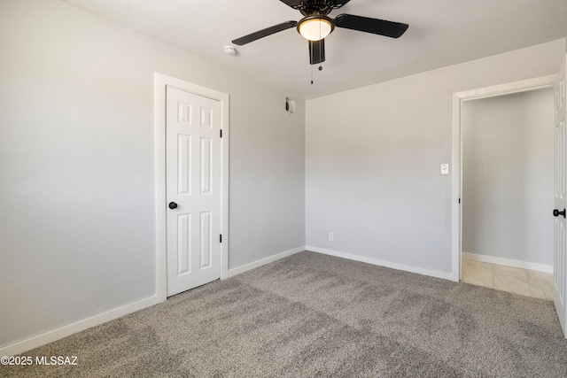 5609 E Juarez St, Tucson, AZ 85711 - spare room with carpet and ceiling fan
