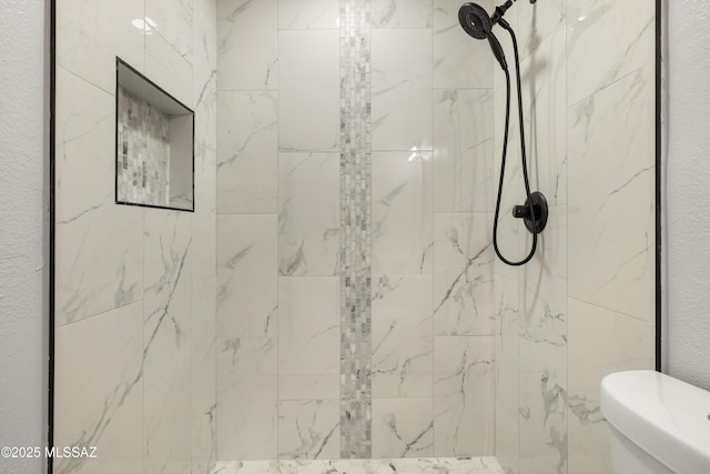 5609 E Juarez St, Tucson, AZ 85711 - full bathroom with a marble finish shower and toilet