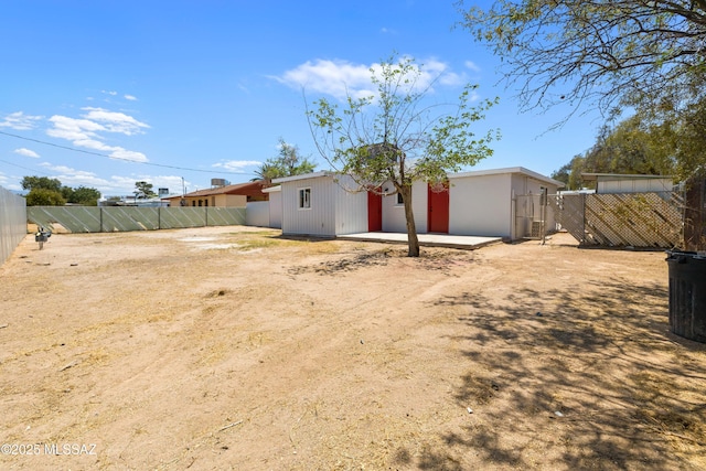 5609 E Juarez St, Tucson, AZ 85711 - back of property featuring a fenced backyard