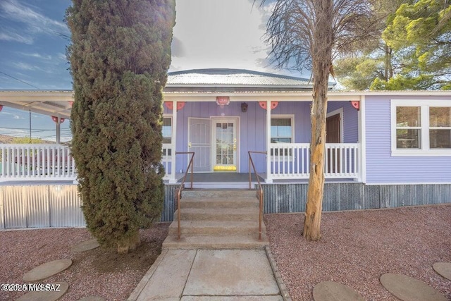 201 B St, Bisbee, AZ 85603 - view of front of house featuring a porch and a metal roof