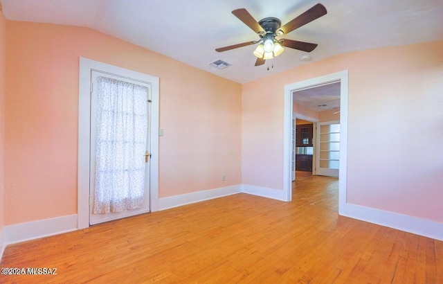 201 B St, Bisbee, AZ 85603 - unfurnished room with light wood-style flooring, a ceiling fan, a smoke detector, and vaulted ceiling