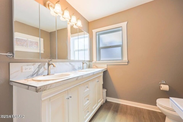 201 B St, Bisbee, AZ 85603 - bathroom with double vanity and wood finished floors