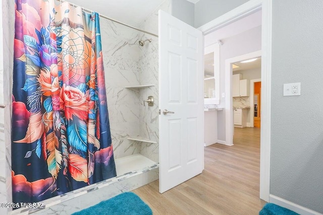 201 B St, Bisbee, AZ 85603 - bathroom with a shower stall and wood finished floors